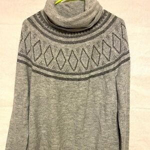 Soft sweater with sparkles and cowl neck